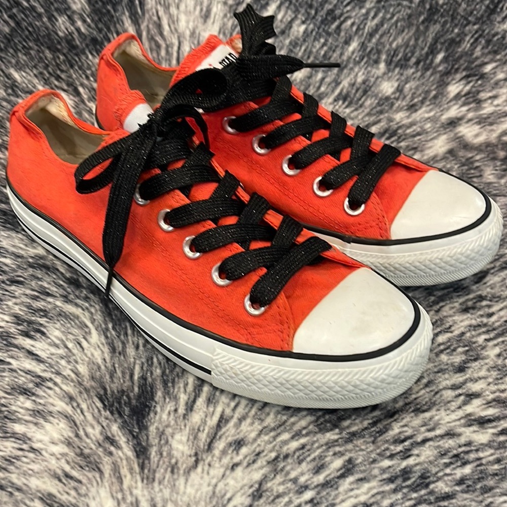 Bright orange Converse shoes with black sparkly laces! Size 8